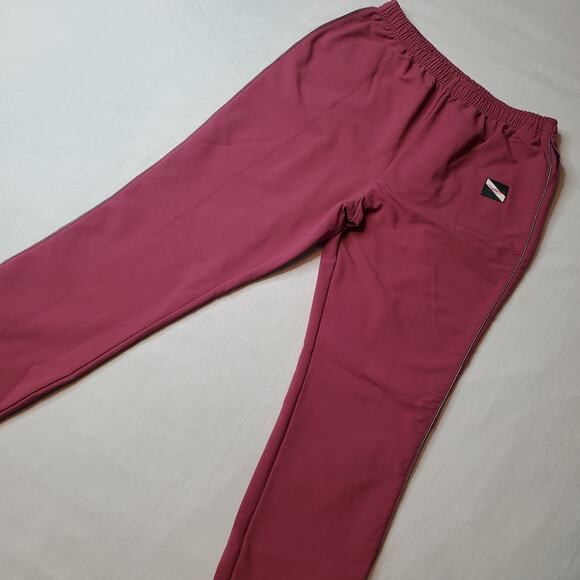 Tracksmith Women's Size M Bislett Pants Pockets Stirrups Pink - Picture 1 of 10